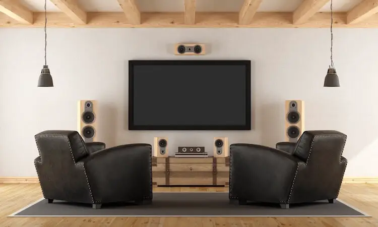 How to hide large speakers in living room?